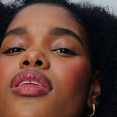 model wears peptide lip shape in sprinkle