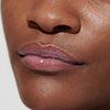 4 different models, each wearing Peptide Lip Tint in shade Ribbon