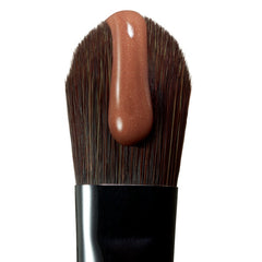peptide lip tint colada on a brush