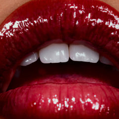 model's lips with raspberry jelly peptide lip tint
