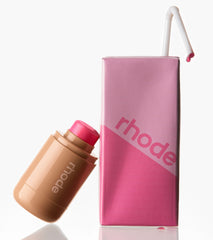 pocket blush next to a pink rhode juice box