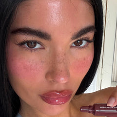 model wears peptide lip tint pbj