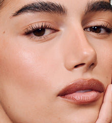 model wearing peptide lip shape in lean