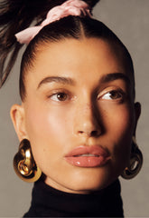 Hailey Bieber wearing ribbon lip tint on lips
