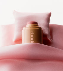 pocket blush sleepy girl in a baby pink blanket