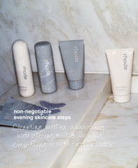 image of rhode skincare collection with copy overlay - non-negotiable evening skincare steps: cleansing, misting, nourishing with glazing milk + locking everything in with barrier butter