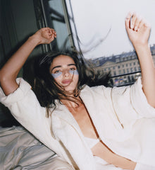 model wearing rhode peptide eye prep