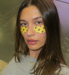 hailey in spotwear and peptide eye prep banana peel