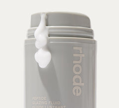 peptide glazing fluid with product oozing out of the bottle