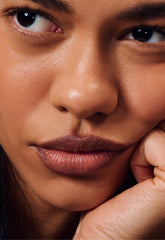 model wearing peptide lip shape in stretch